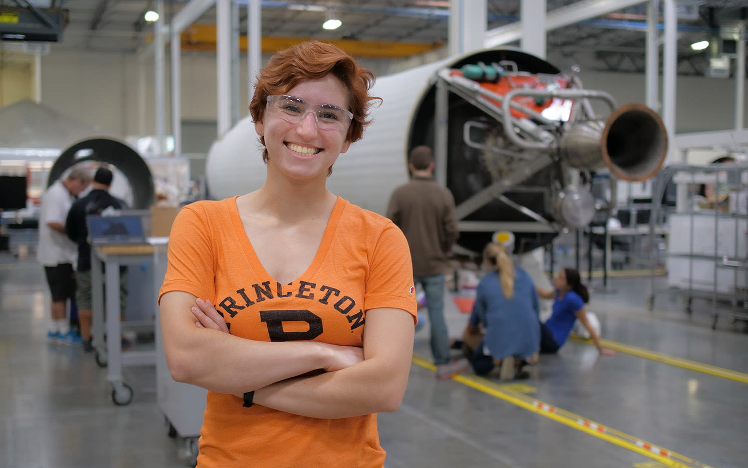 Isabel Cleff in front of one of Virgin Orbit's rockets, taken during her internship