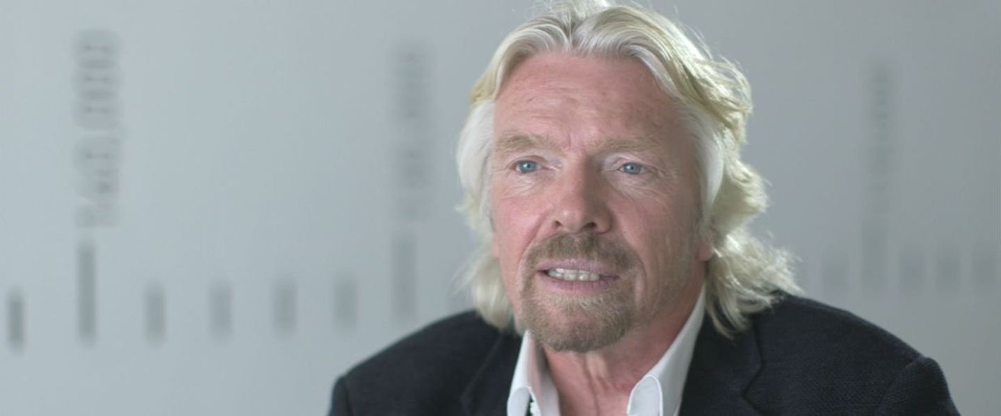 Close up of Richard Branson in a black blazer