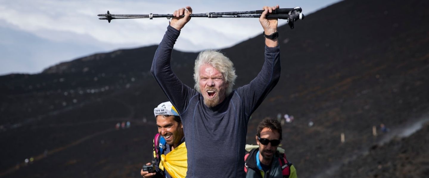 Richard Branson hiking and cheering