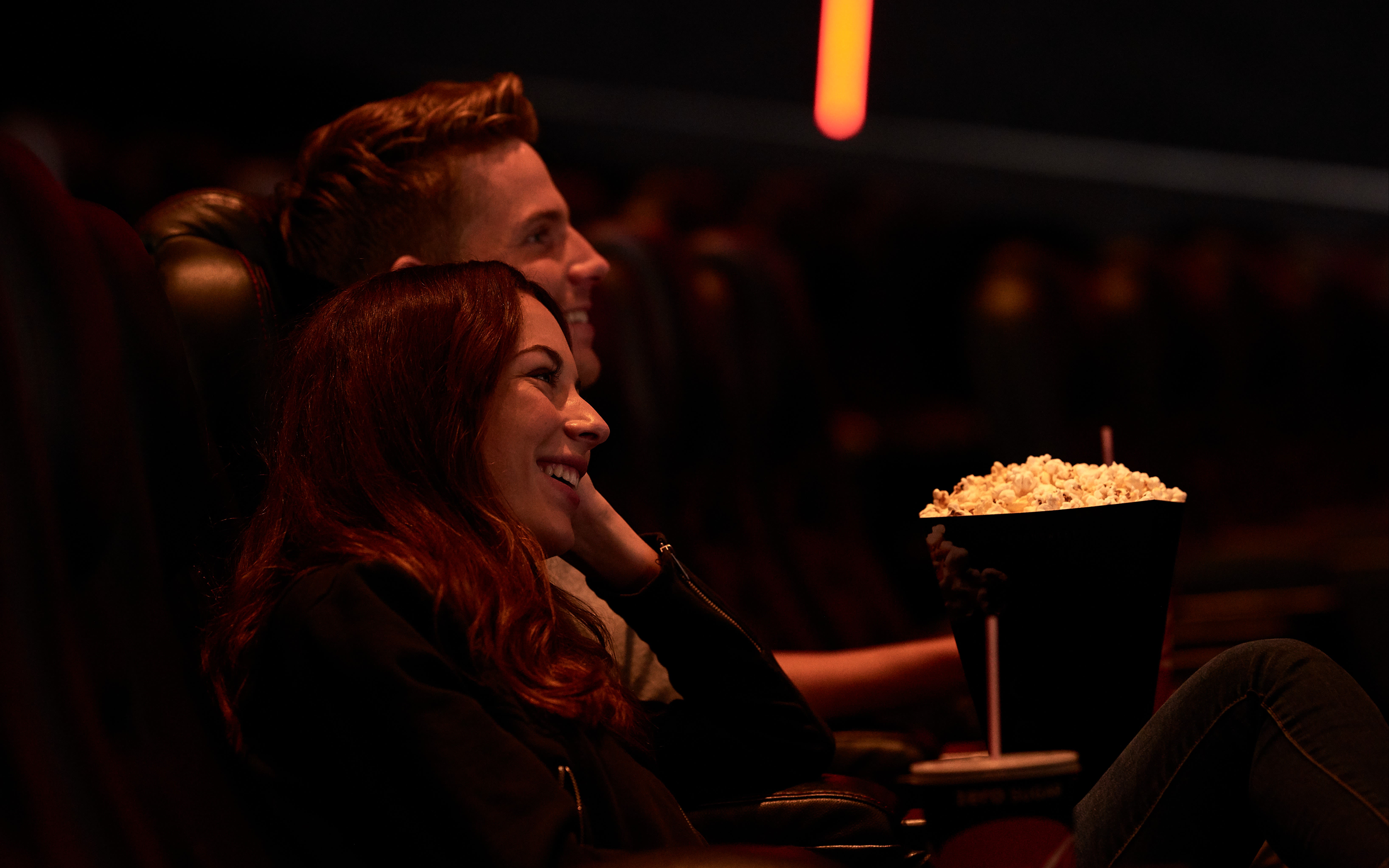 Image of a couple at the Cinema.