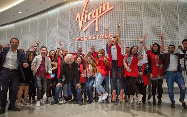 Richard Branson with Virgin Megastore employees