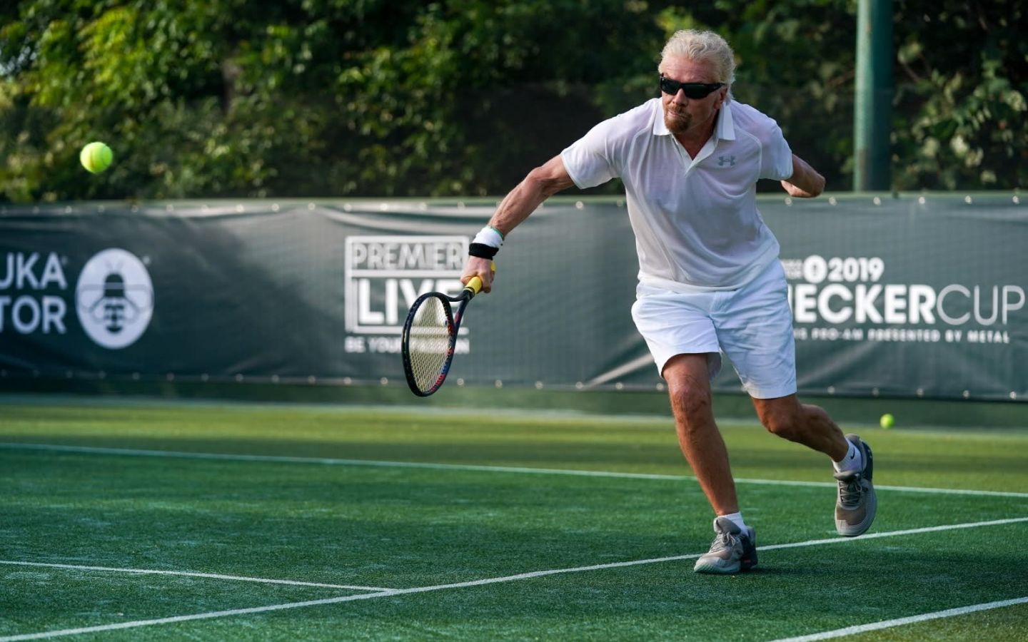 Richard Branson playing tennis