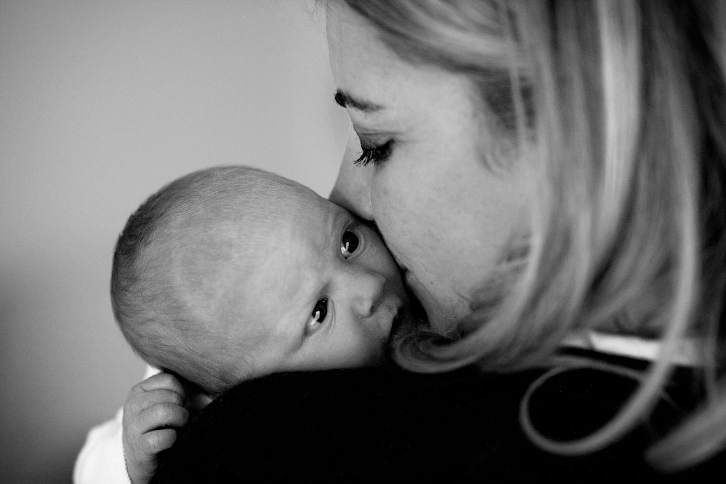 Holly with her daughter Lola as a new born