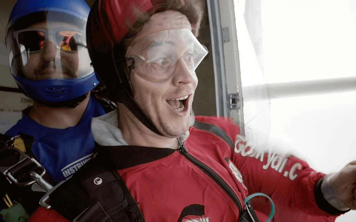 Two people prepare to go skydiving with Virgin Experience Days