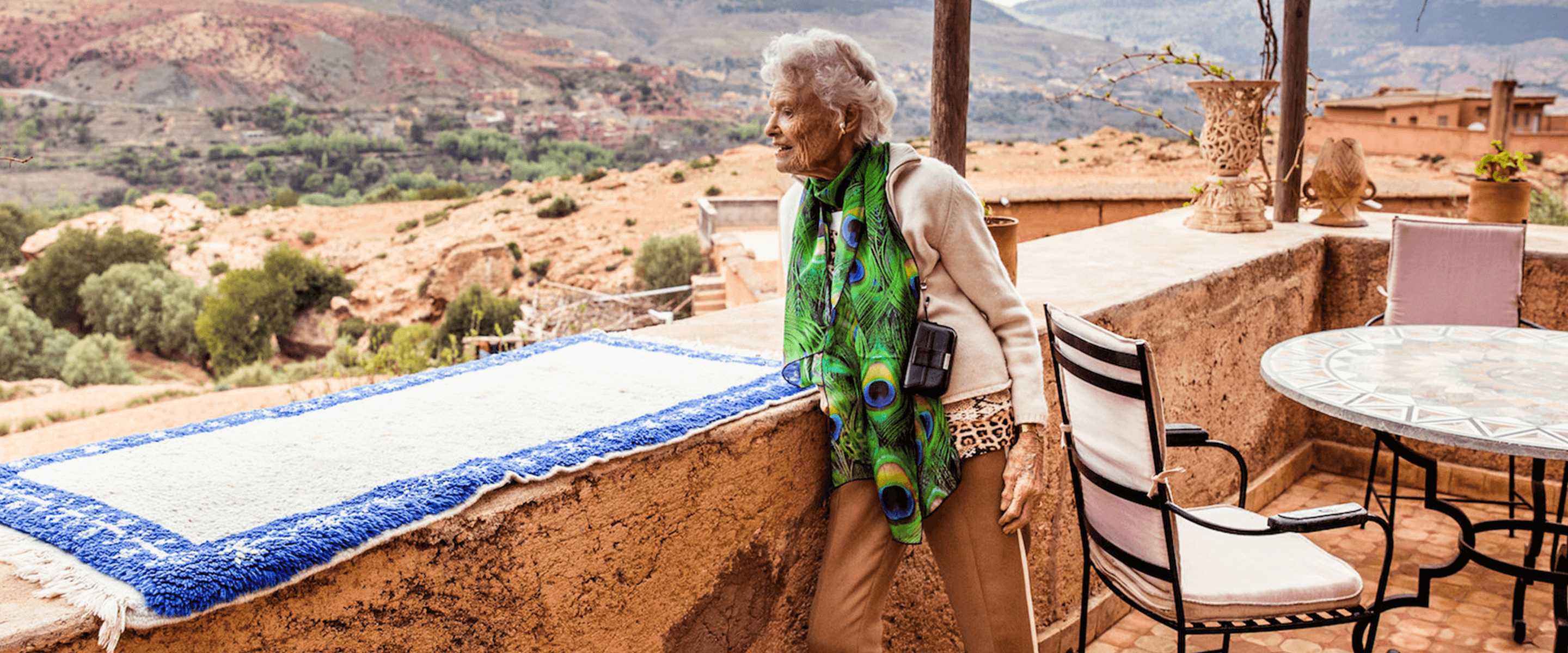 Eve Branson looking out over the Moroccan hillside from a balcony