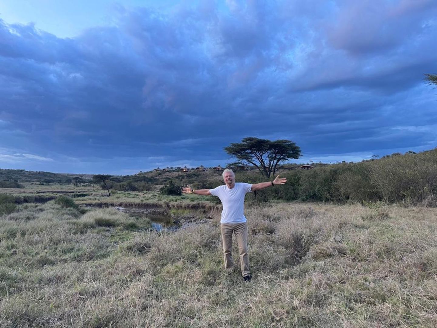 Richard Branson standing in the Savannah