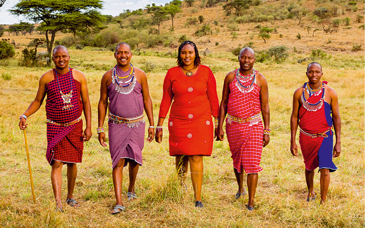Virgin Limited Edition team members at Mhali Mzuri walking across a field