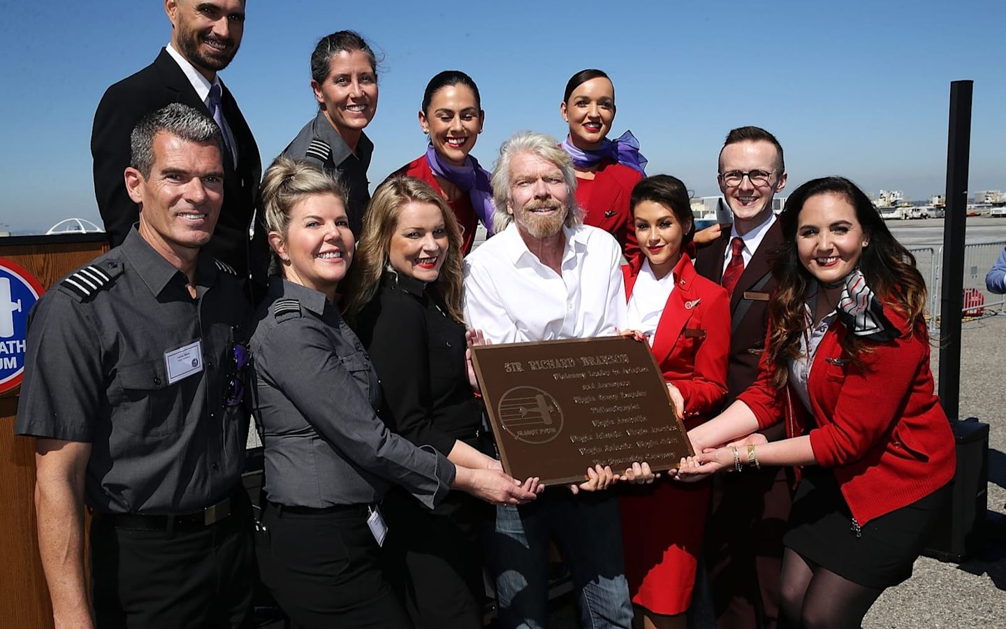 Richard Branson with Virgin Atlantic crew members