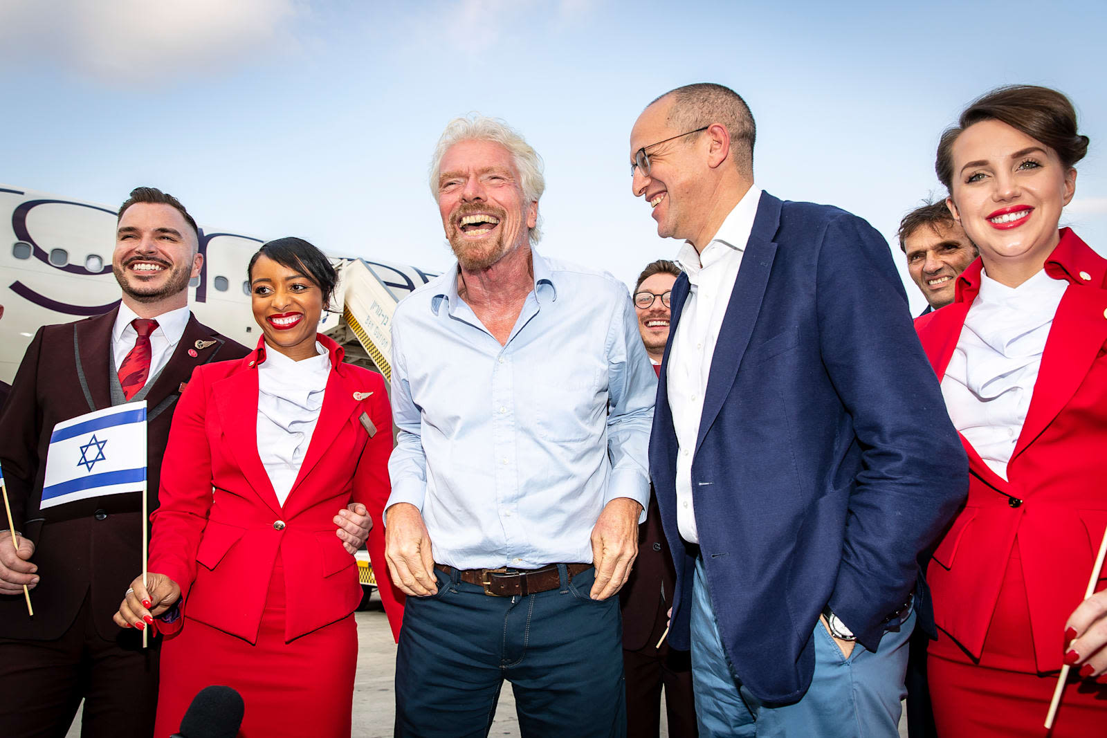 Richard Branson with Virgin Atlantic CEO Shai Weiss and Virgin Atlantic cabin crew celebrating the inaugural flight to Tel Aviv