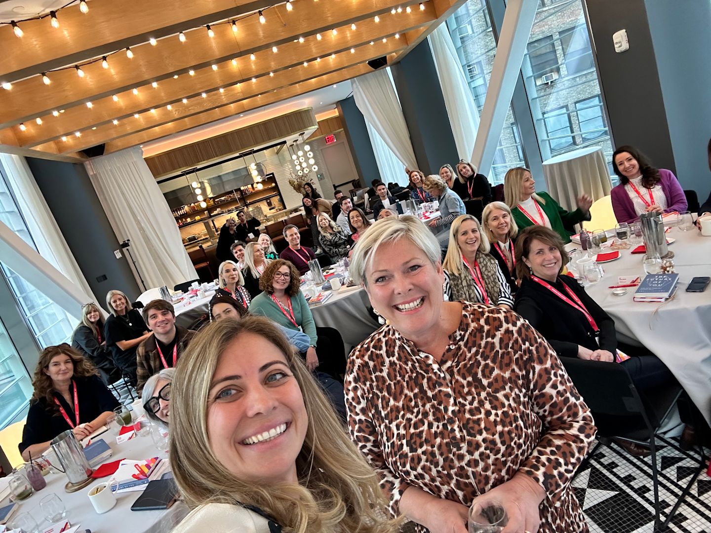 Holly Branson and Halla Tomasdottir in New York with Virgin employees