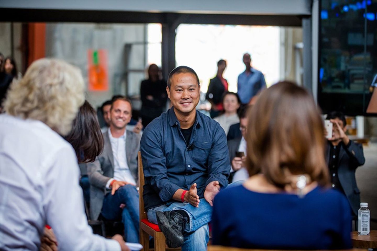 Tony Hsieh on stage at Disruptors