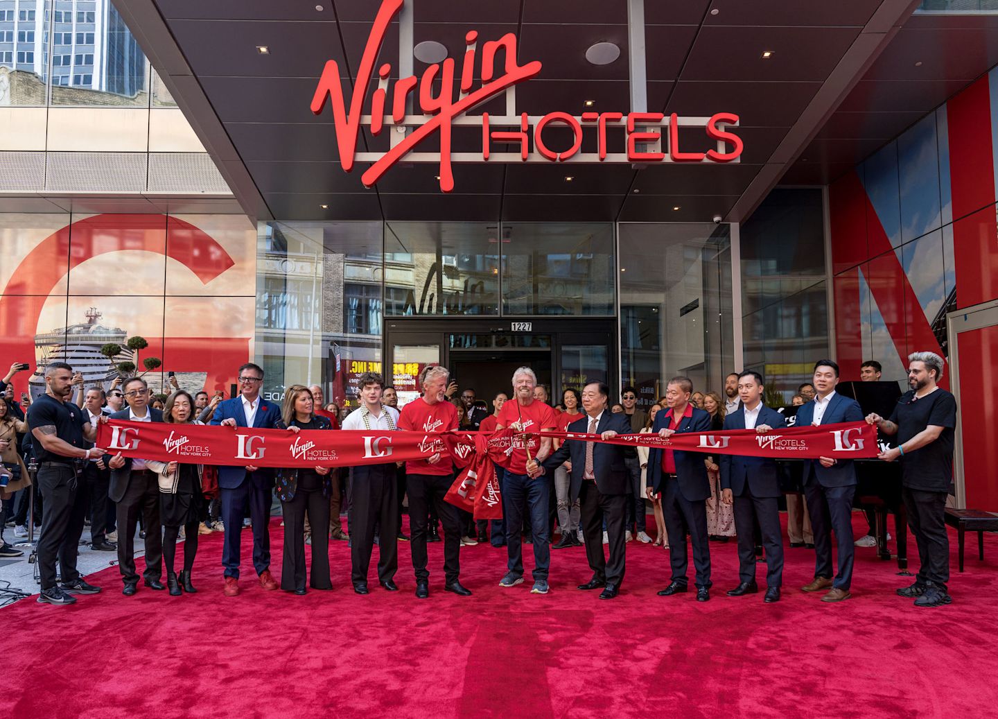 Richard Branson cutting the ribbon of Virgin Hotels New York City