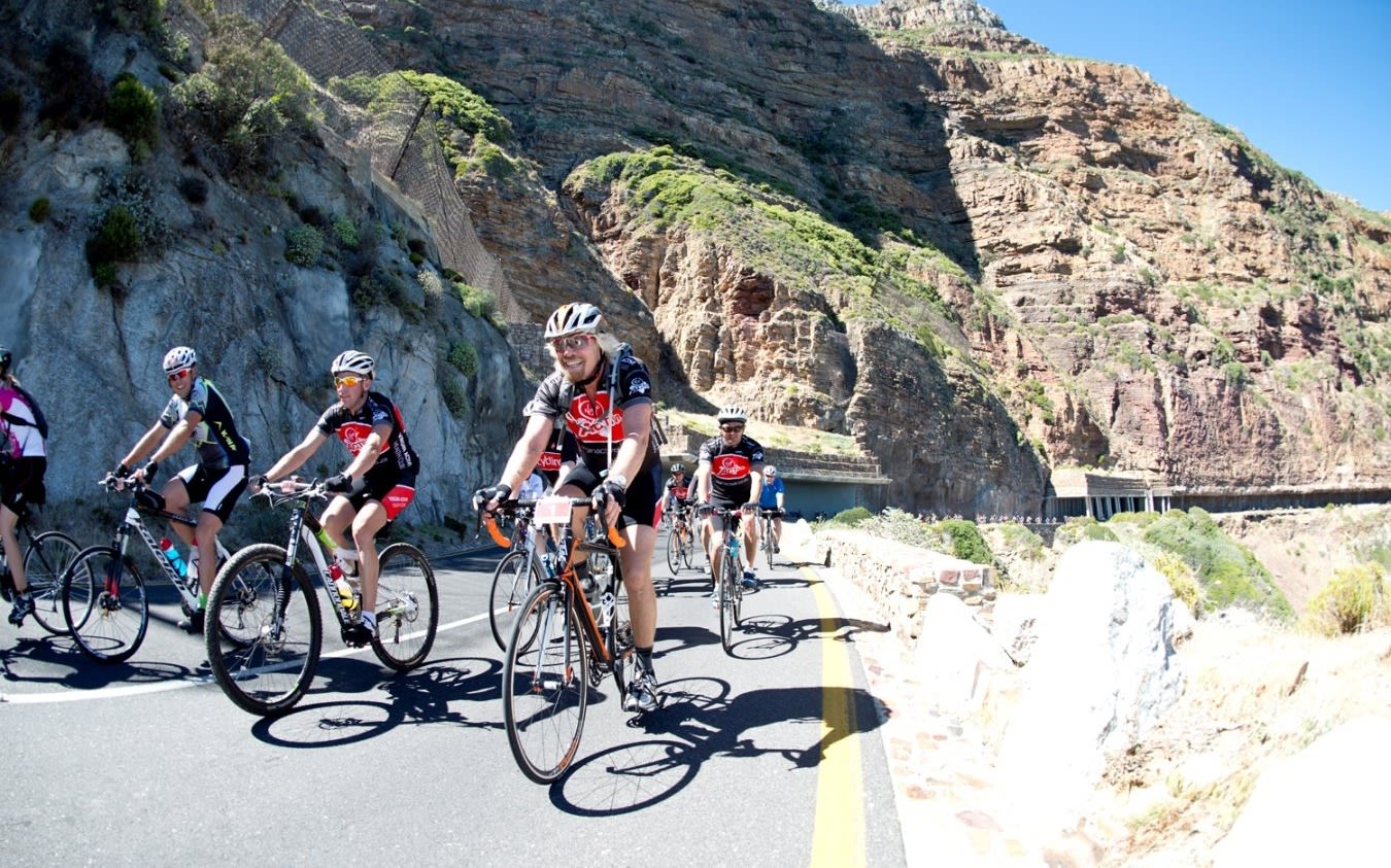 Richard Branson cycling in South Africa