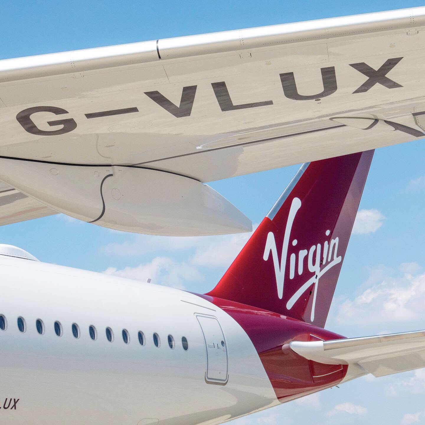 The tail fin and underwing of Virgin Atlantic's Airbus A350 G-VLUX