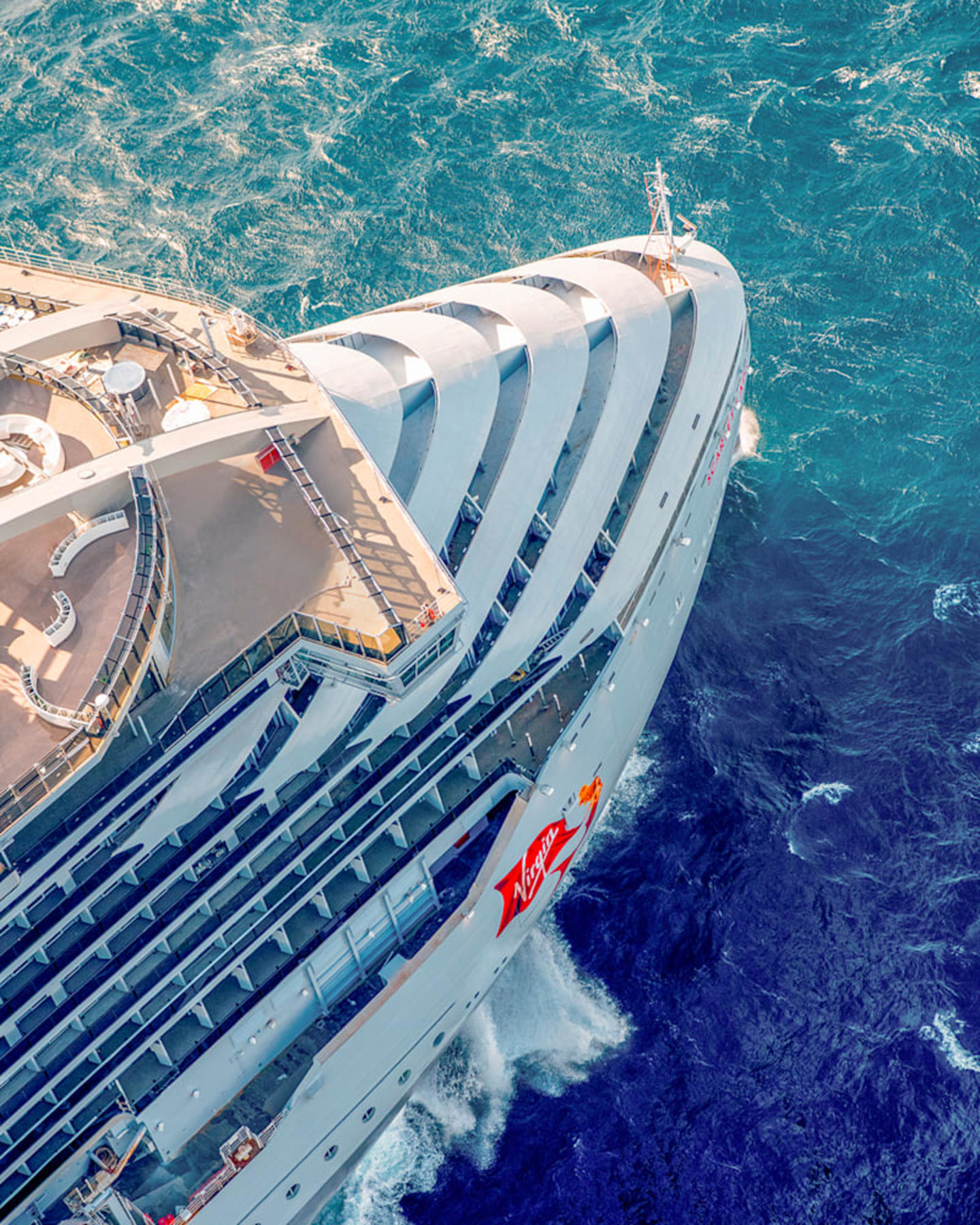 An aerial view of the front of Virgin Voyages' ship Scarlet Lady