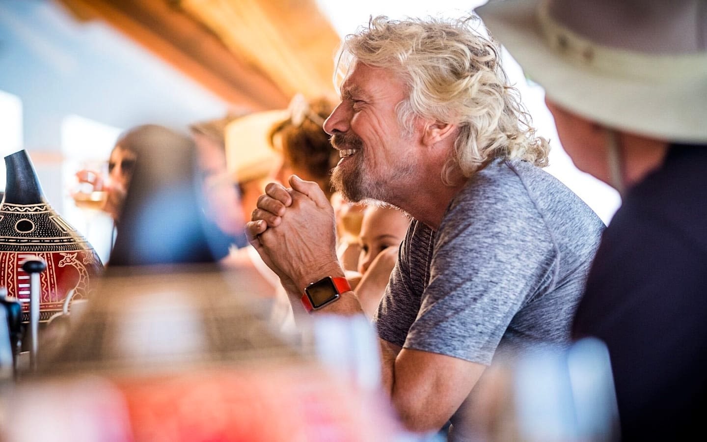 Richard Branson smiling in a meeting at Ulusaba in South Africa 2016