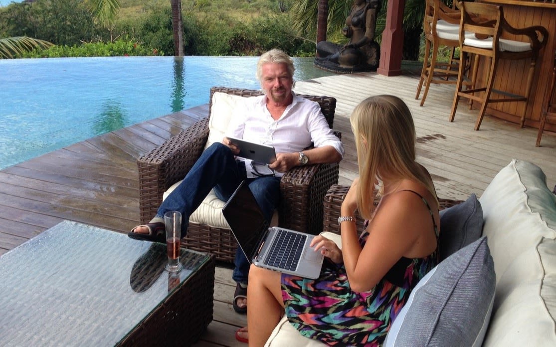 Richard Branson with his assistant working on Necker 