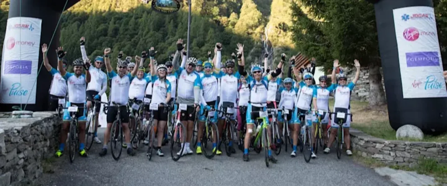 Cyclists stood with their bikes at the start of the race