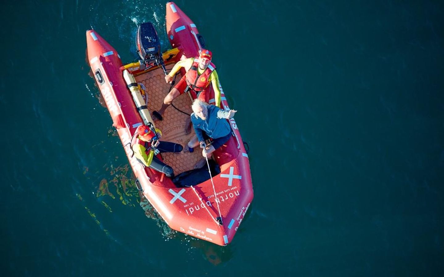 Richard Branson on a surf rescue boat at Bondi Beach