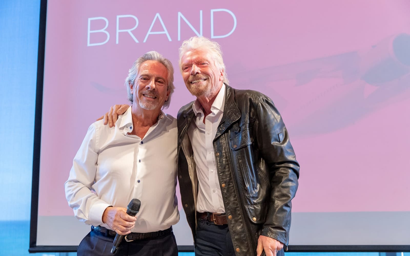 Richard Branson with a future astronaut at Pitch to Rich in Tel Aviv