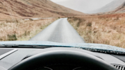 View from car windscreen of country road