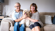 Beanie with her owners Martin and Jane