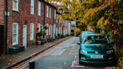 Row of houses with car parked in front