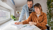 Couple looking through their bills