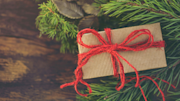 Christmas gift and festive greenery