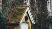 A house with a wreath on the door