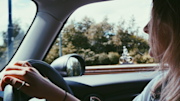 Person driving a car