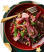 Salade met roodlof, eendenborstfilet en pistache