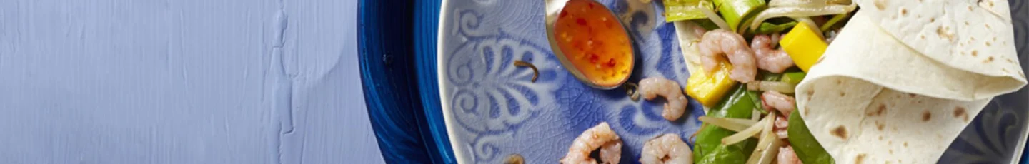 Wraps recept van gevulde wraps met garnalen en mango.