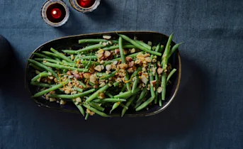 Haricots verts met hazelnoot-amandelcrumble