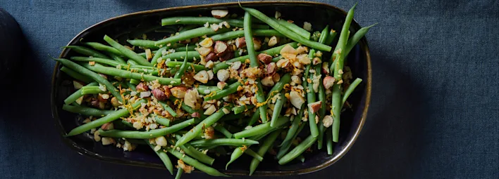 Haricots verts met hazelnoot-amandelcrumble