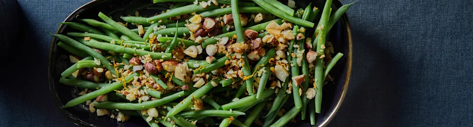 Haricots verts met hazelnoot-amandelcrumble