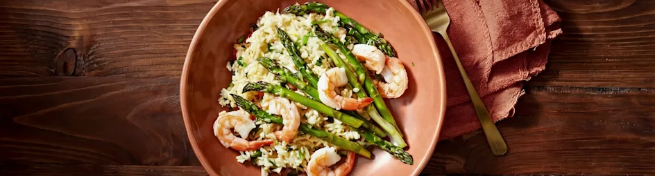 Smeuïge knoflookrijst met garnalen