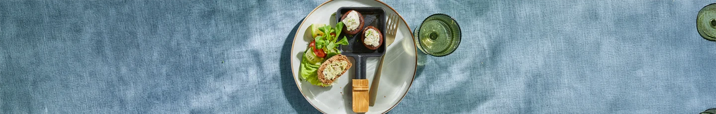 Vegetarisch gourmet recept van gevulde kastanjechampignon met kruidenkaas.