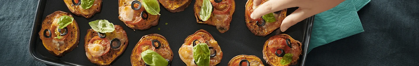 Hapjes voor oud & nieuw op een borrelplank.