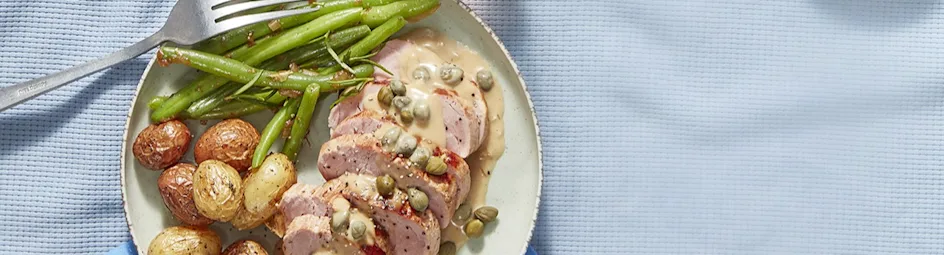 Varkenshaas in kappertjessaus met rozemarijnboontjes