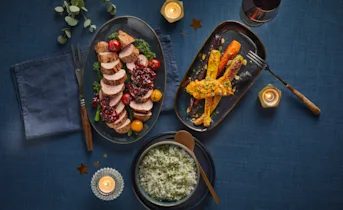 Varkenshaas met cranberry-stoofpeersaus en kruidenrijst