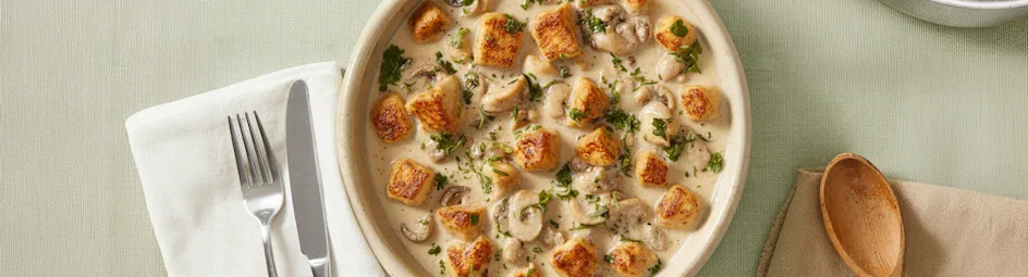 Romig stoofpotje met kip en champignons in briesaus