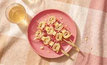 Pannenkoekspiesjes met ham en kaas