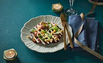 Rode bietencarpaccio met truffel en hazelnoten