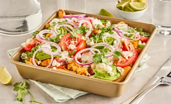 Loaded frites met kip, paprika en avocado