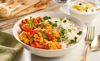 Vegetarische curry madras met mango