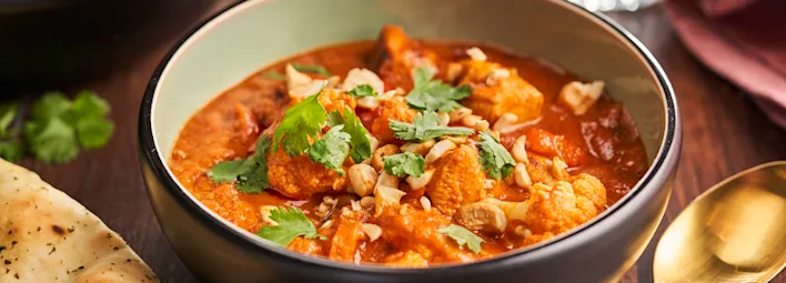 Butter chicken met bloemkool en cashewnoten