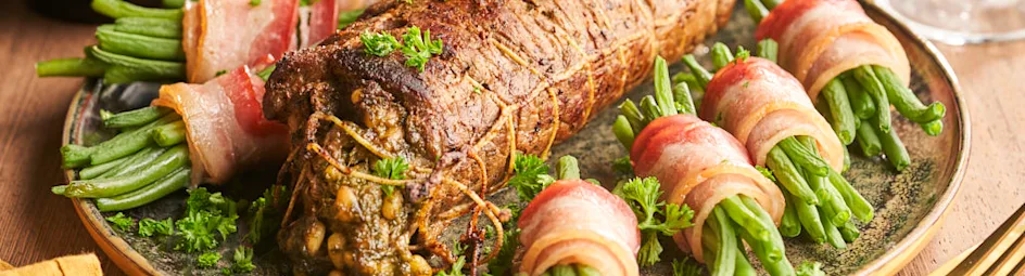 Carpacciorollade met paddenstoelenroomsaus en boontjes met spek