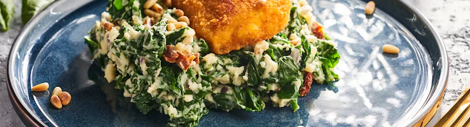 Spinaziestamppot met kaasschnitzel