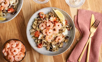 Risoni met aubergine, feta en garnalen